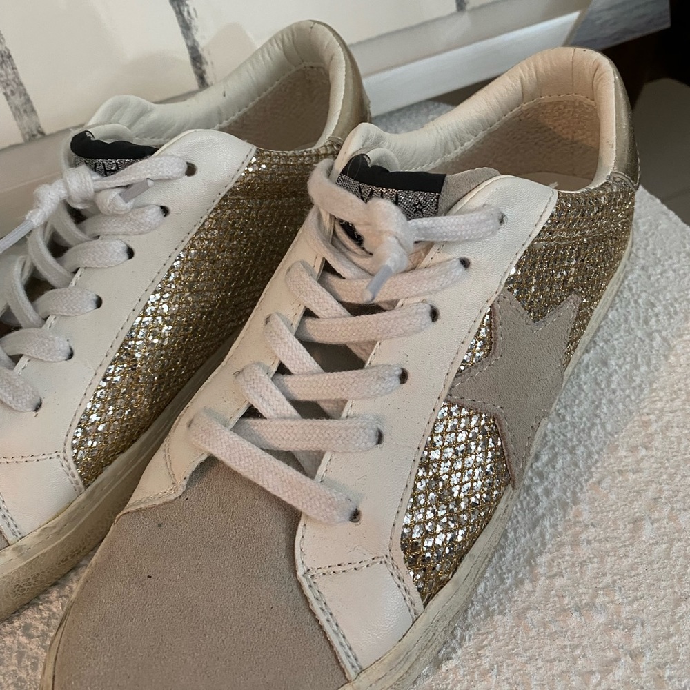 VH gold sparkling sneakers with a star